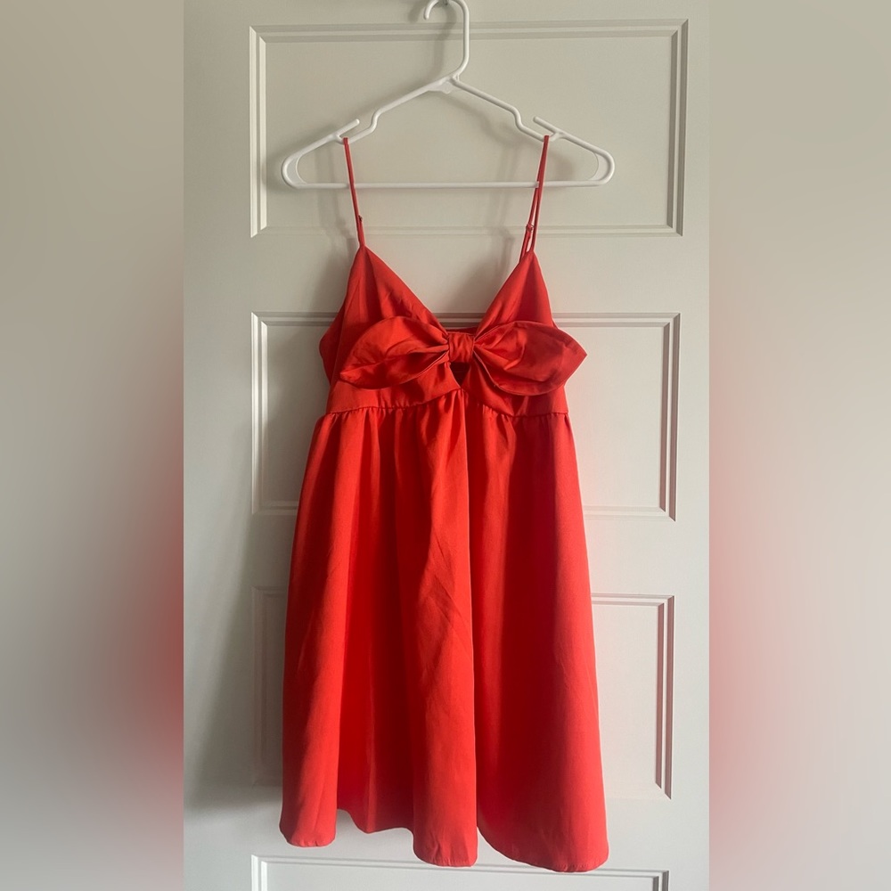 Orange bow mini dress